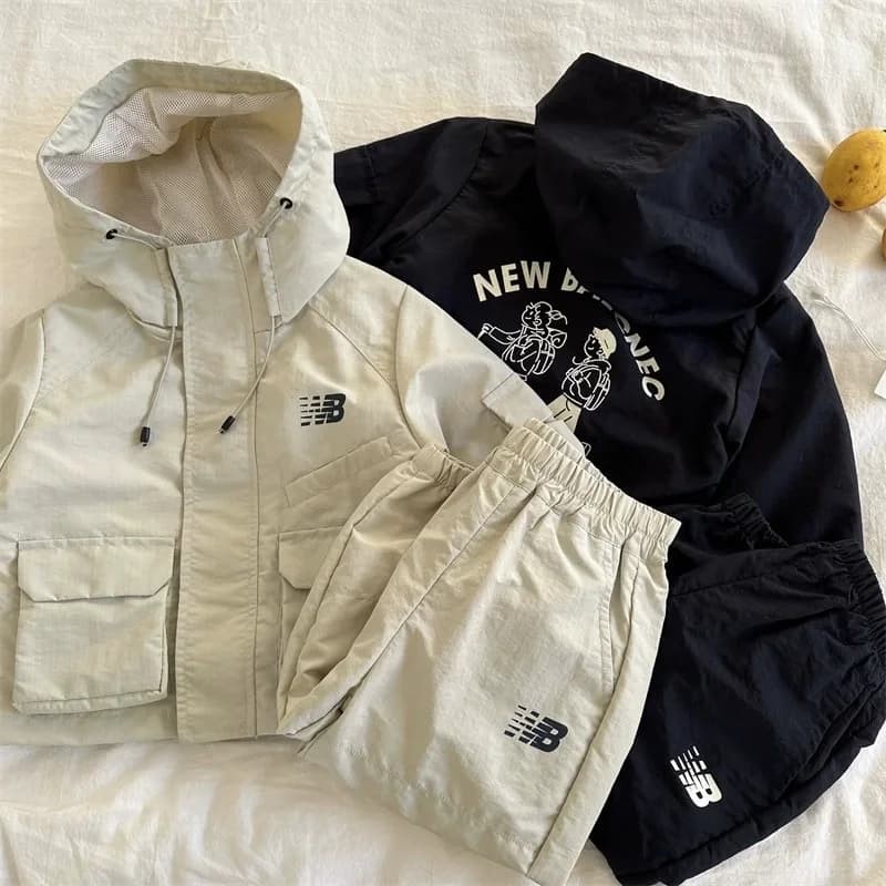 Детский костюм New Balance: куртка и брюки